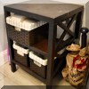 F49. Tiered side table. 